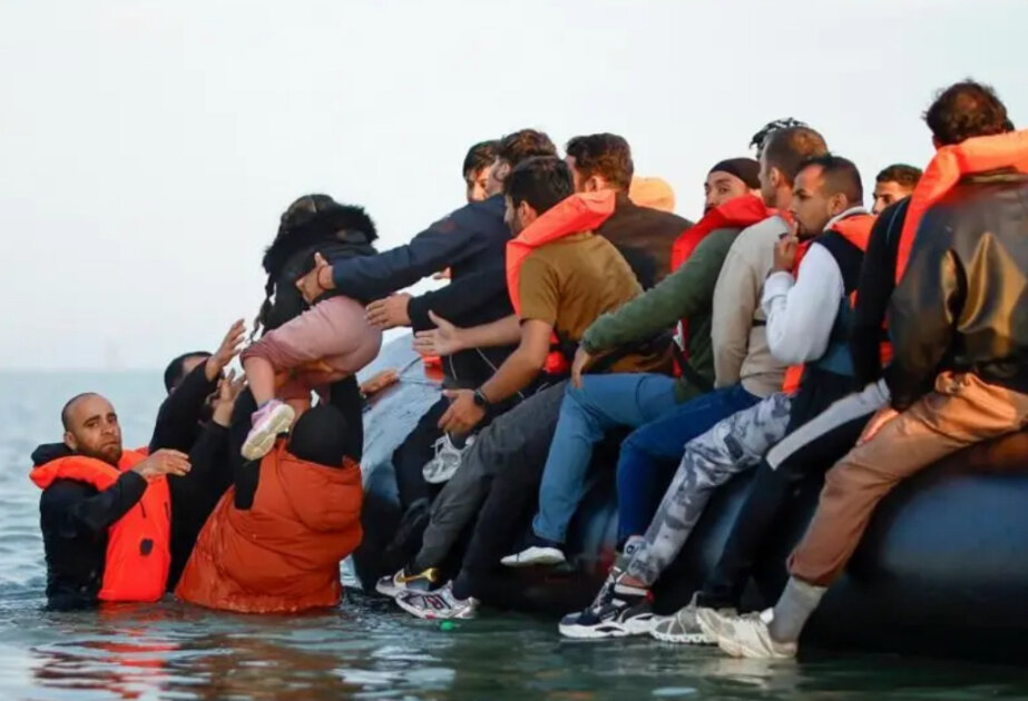 UK government pledges extra £100m to tackle people smuggling
