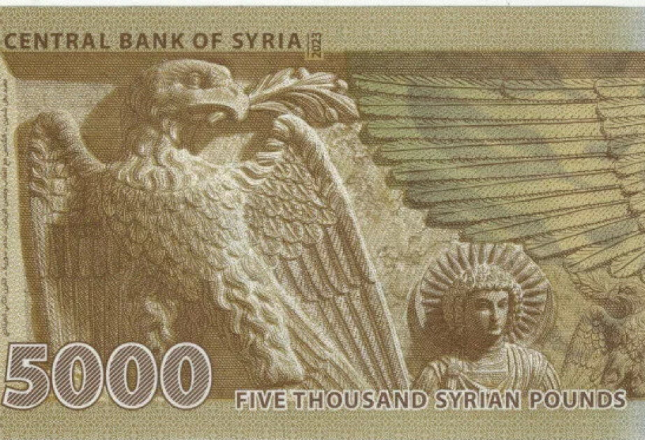 Syria to revalue currency, dropping two zeros in bid for stability